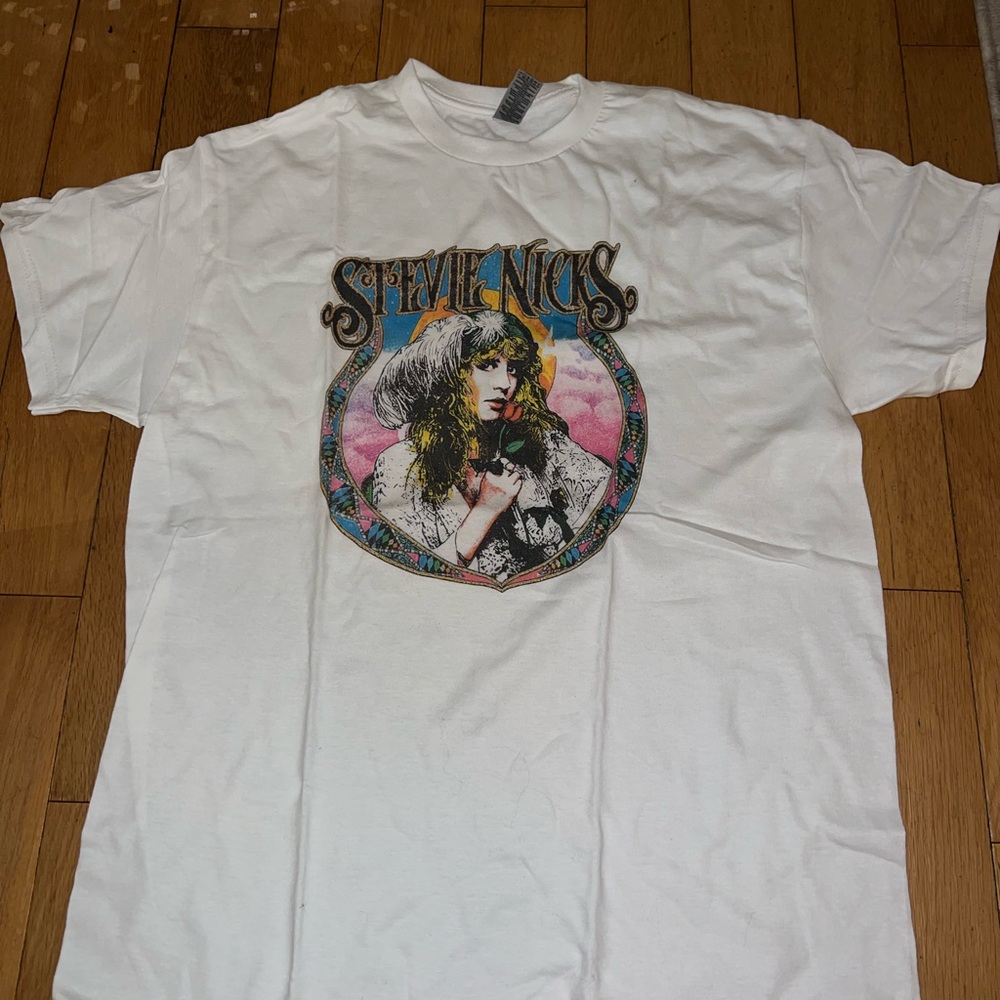 Four different band t shirts